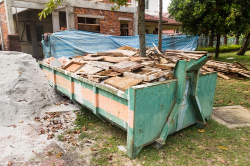 Professional home clearance team working in a Deptford home