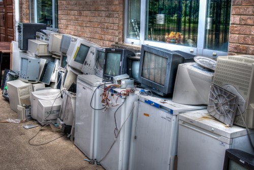 Professional team clearing a cluttered garage